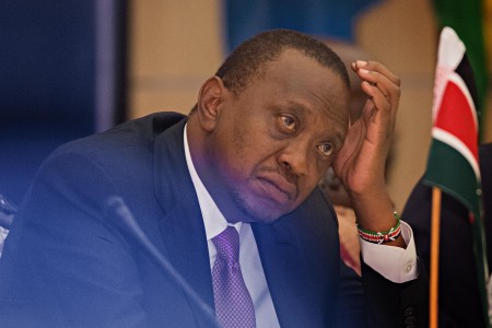 Kenyan president Uhuru Kenyatta reacts as EAC chair and Tanzanian president Jakaya Kikwete discusses the crisis in Burundi on Wednesday. Photo: Daniel Hayduk