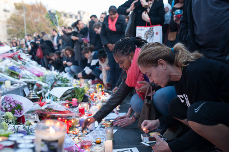 People gather at a memorial in Paris. A vigil will be held at the French Embassy in Dar on Tuesday, November 17 at 18:30. Photo: Flickr user did.van